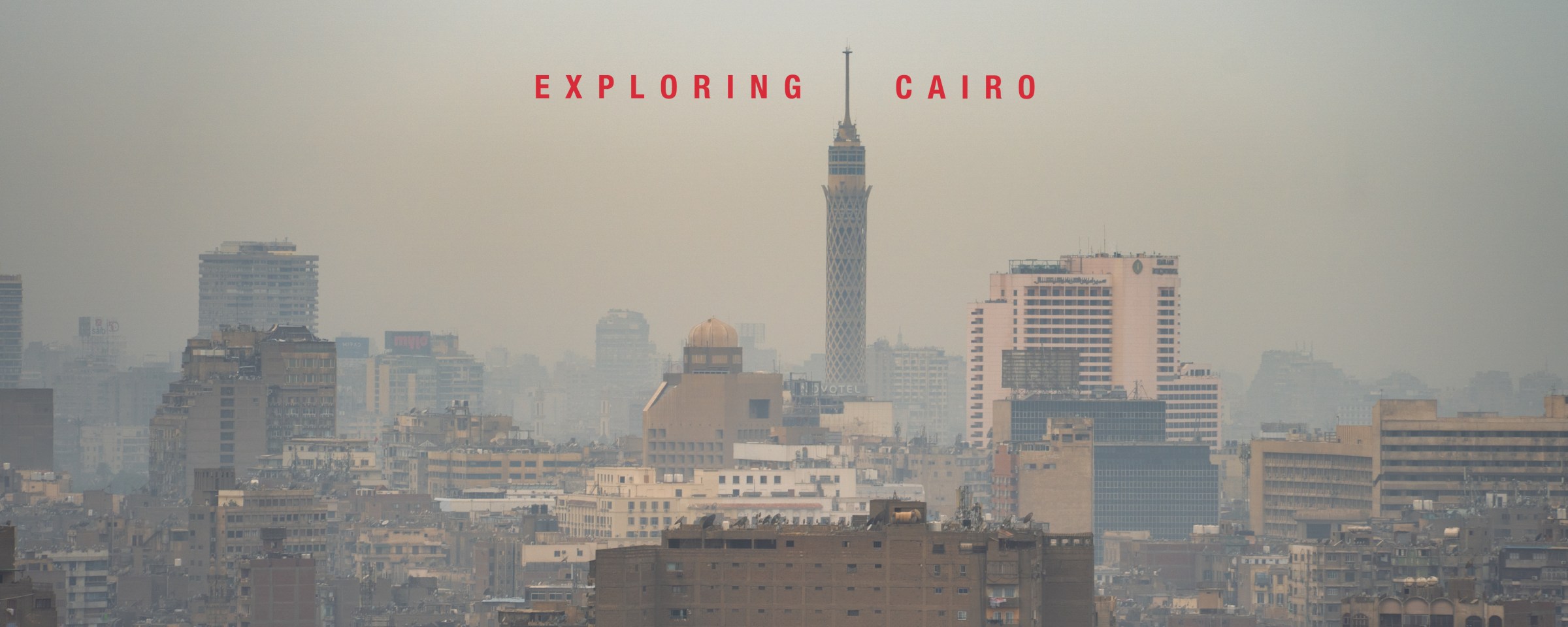 Cairo skyline with a minaret and the title Exploring Cairo.